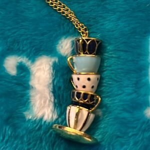 552 – stack teacup necklace, gold town